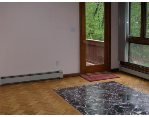 26 Perry Road Athol, MA 01331 - Photo 8 of 10 a view of an empty room with a window