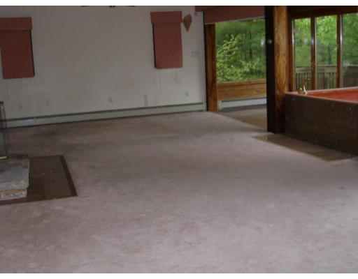 26 Perry Road Athol, MA 01331 - Photo 9 of 10 a view of a car garage with a road