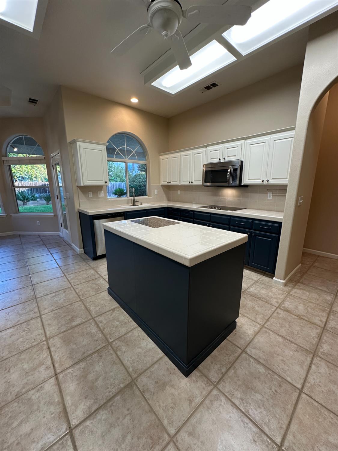 535 West Decatur Avenue Clovis, CA 93611 - Photo 13 of 51 a kitchen with a sink a counter top space and appliances