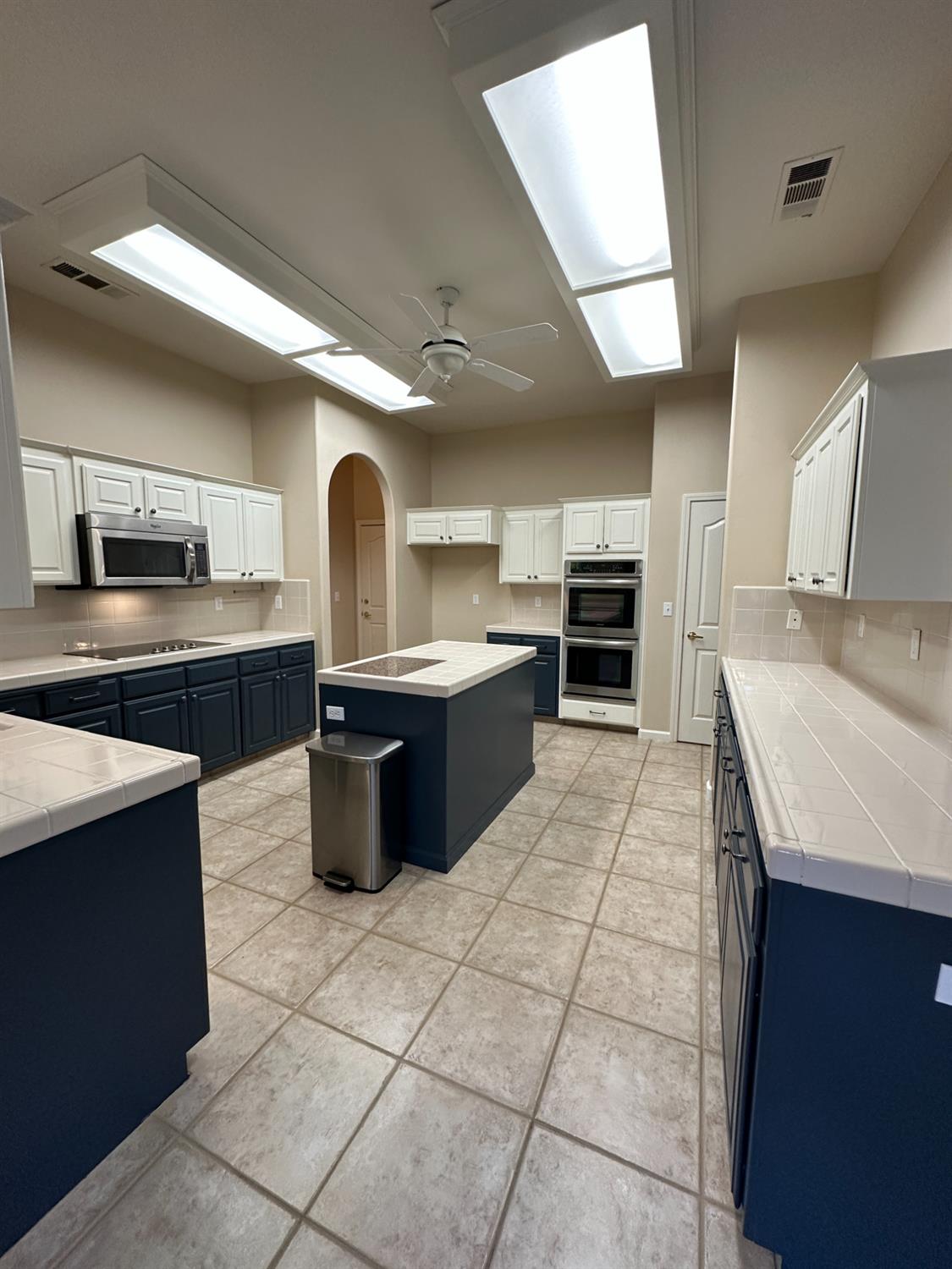 535 West Decatur Avenue Clovis, CA 93611 - Photo 16 of 51 a large kitchen with stainless steel appliances granite countertop a stove and a sink