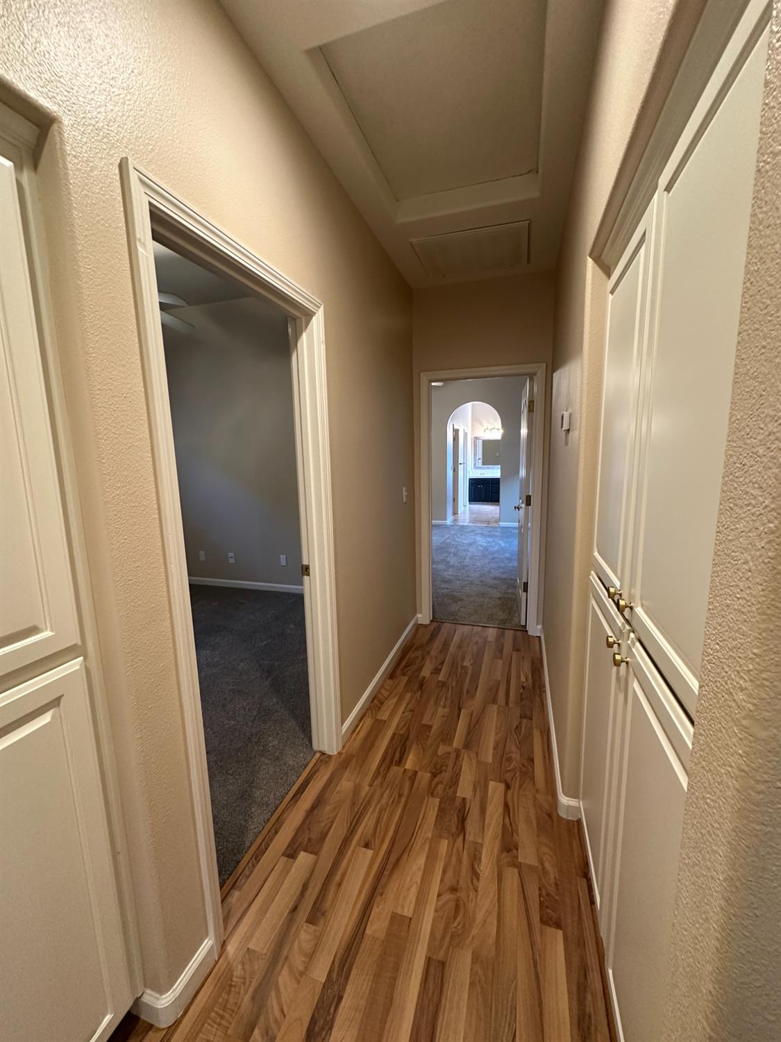 535 West Decatur Avenue Clovis, CA 93611 - Photo 25 of 51 a view of a hallway with wooden floor and staircase