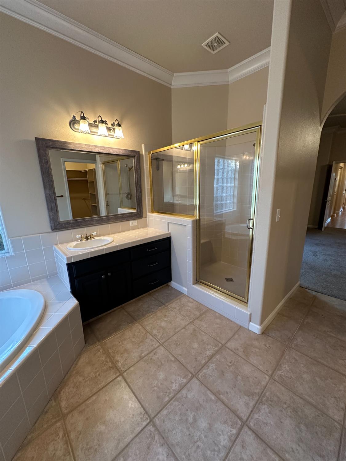 535 West Decatur Avenue Clovis, CA 93611 - Photo 35 of 51 a view of kitchen with granite countertop cabinets and window