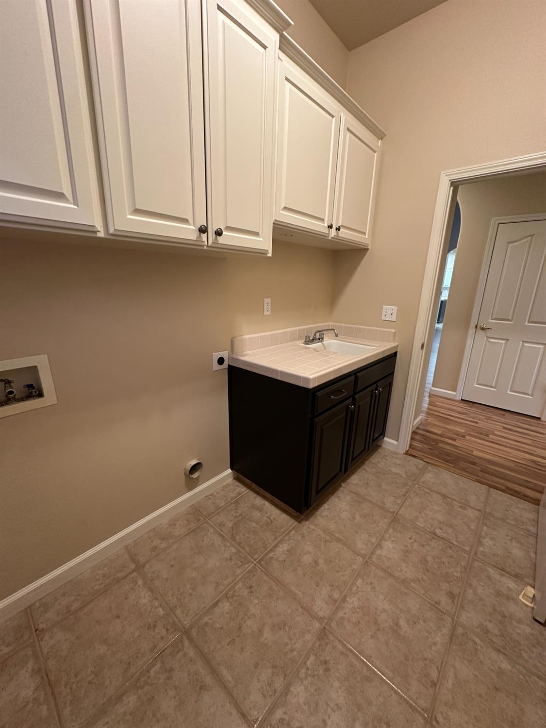 535 West Decatur Avenue Clovis, CA 93611 - Photo 40 of 51 a room with a sink and cabinets