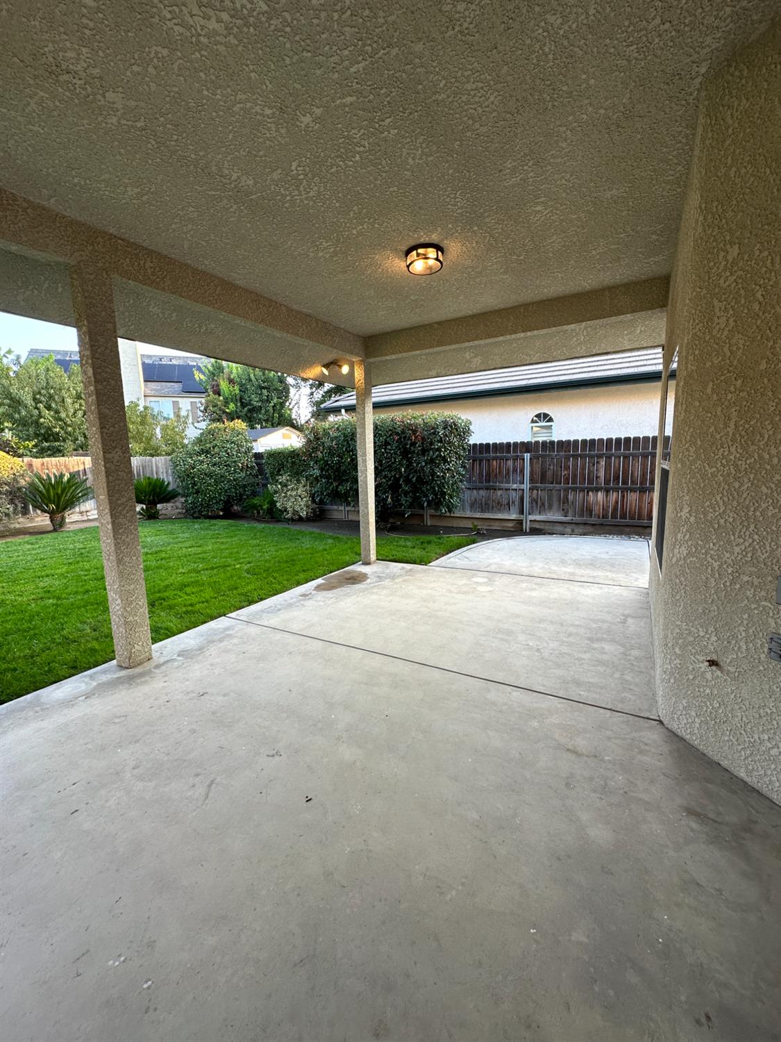 535 West Decatur Avenue Clovis, CA 93611 - Photo 47 of 51 a view of a house with porch and garden