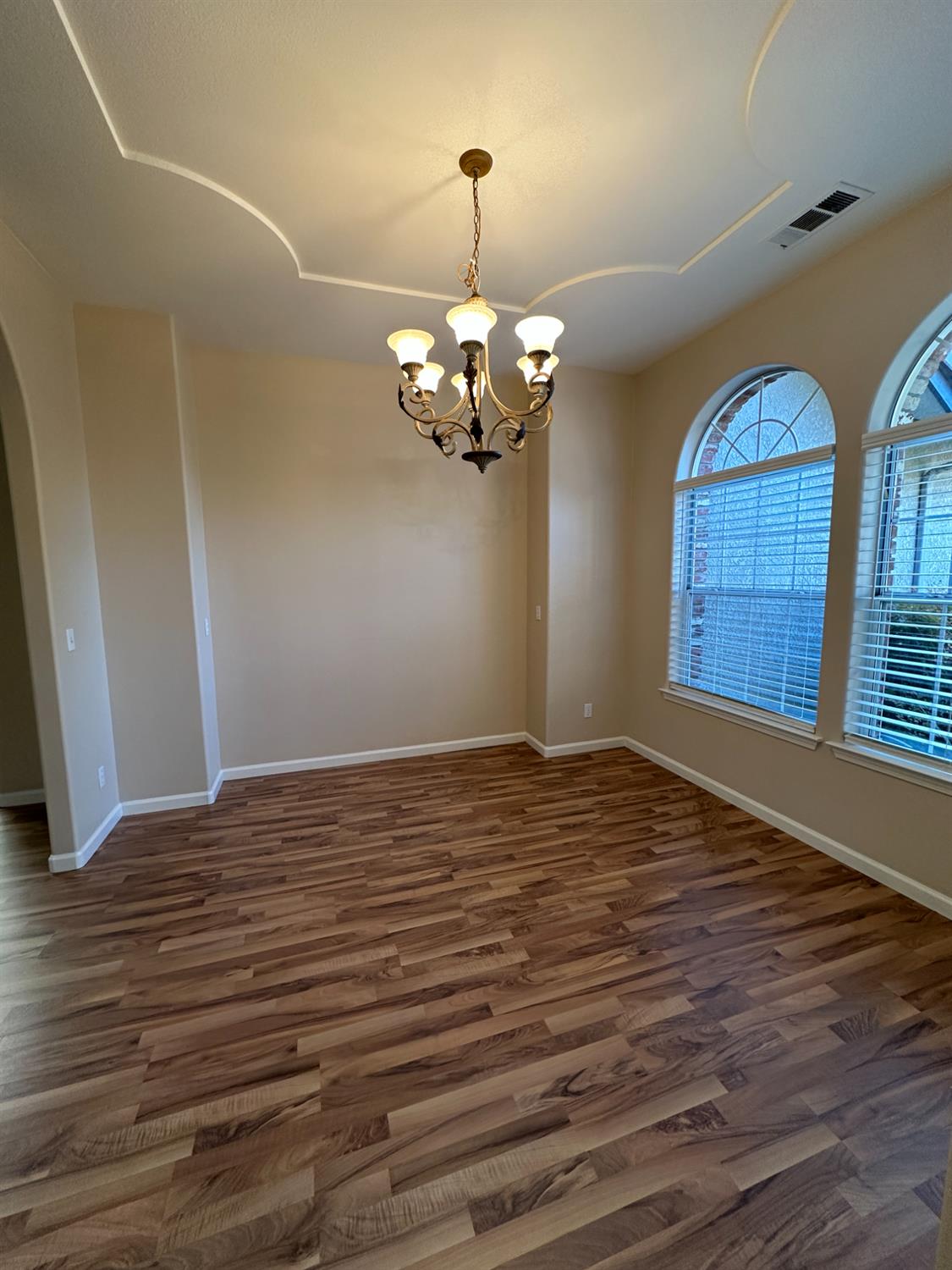 535 West Decatur Avenue Clovis, CA 93611 - Photo 8 of 51 a view of a livingroom with a chandelier