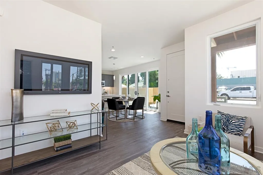 4007 Mission Inn Avenue Riverside, CA 92501 - Photo 6 of 25 a living room with furniture and large windows