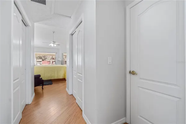 a view of a dining area with furniture and a large window