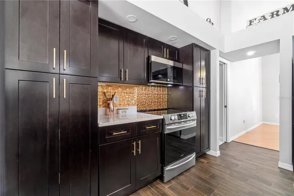 a view of a livingroom with couch and a livingroom