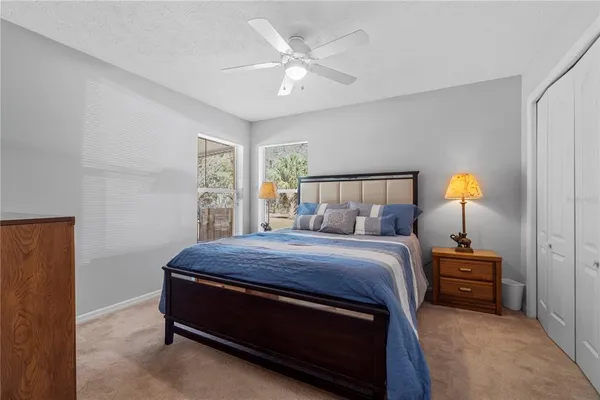 a bathroom with a toilet a sink and a mirror