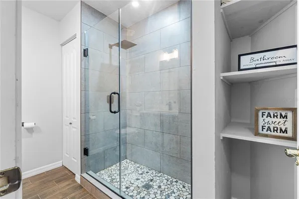 a bed room with a bed and a window