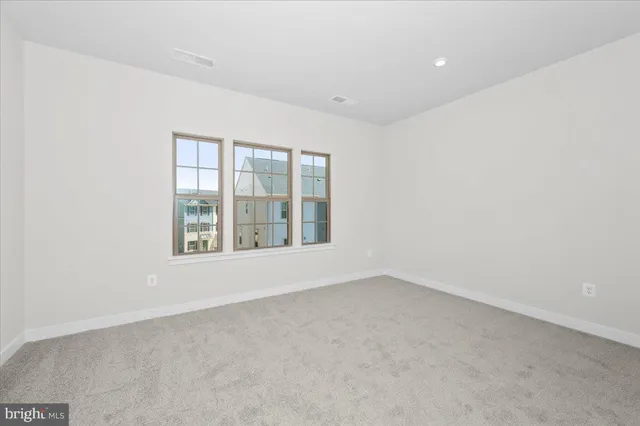 a bathroom with a shower and a bath tub