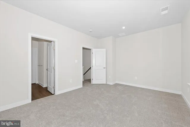 a view of a room with racks on the wall