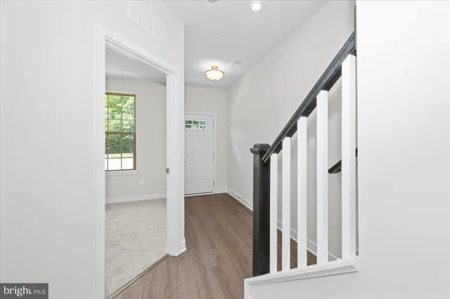 a view of an entryway with staircase