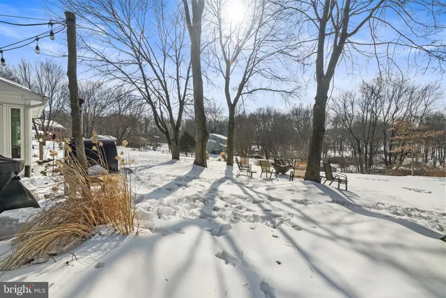 a view of snow on the side of road