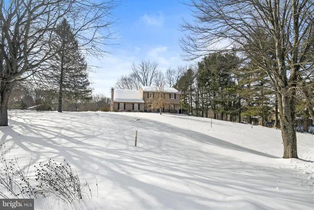 a view of road and covered with snow