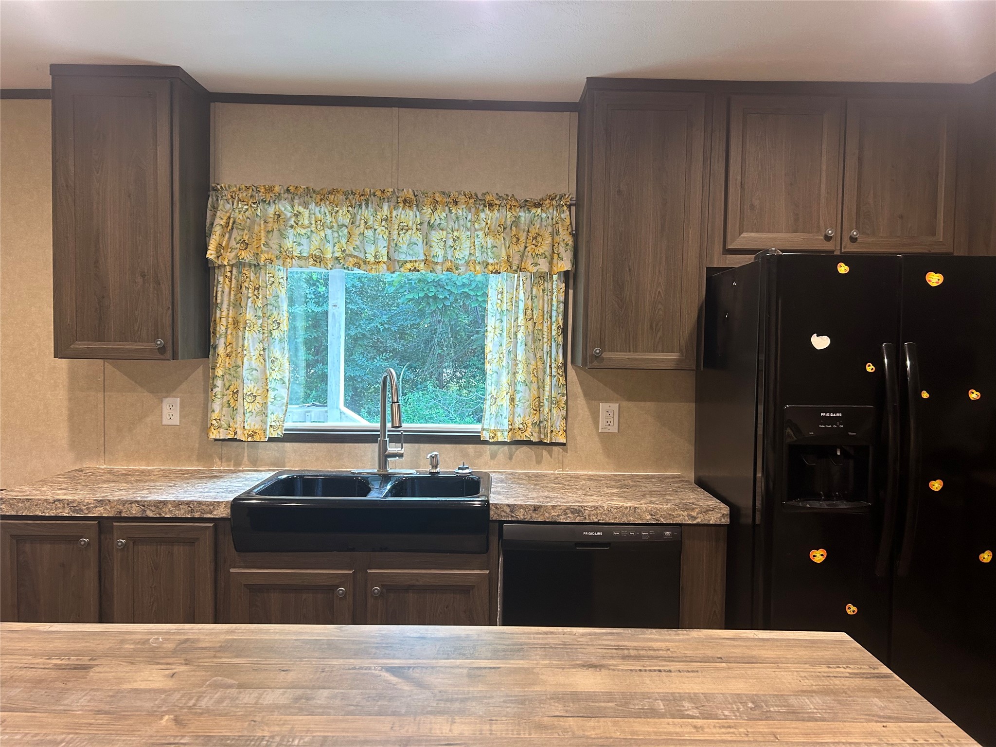 164 Parker Road Corrigan, TX 75939 - Photo 11 of 34 a kitchen with a sink and large window