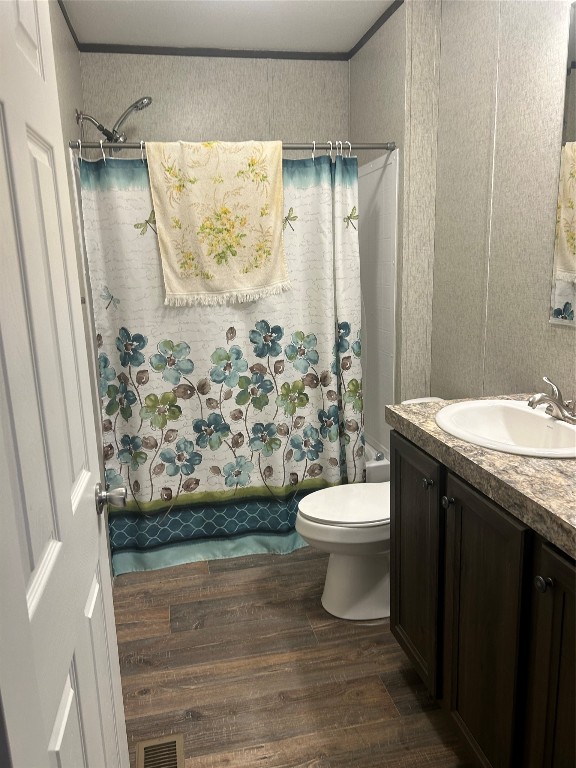 164 Parker Road Corrigan, TX 75939 - Photo 12 of 34 a bathroom with a granite countertop toilet sink and shower