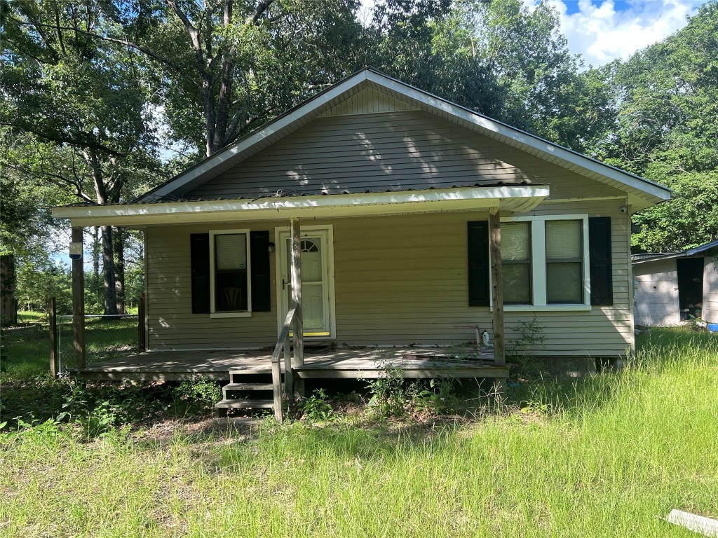 164 Parker Road Corrigan, TX 75939 - Photo 18 of 34 a front view of a house with a yard