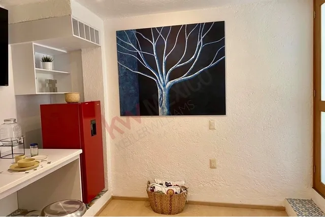 a bathroom with a sink and mirror