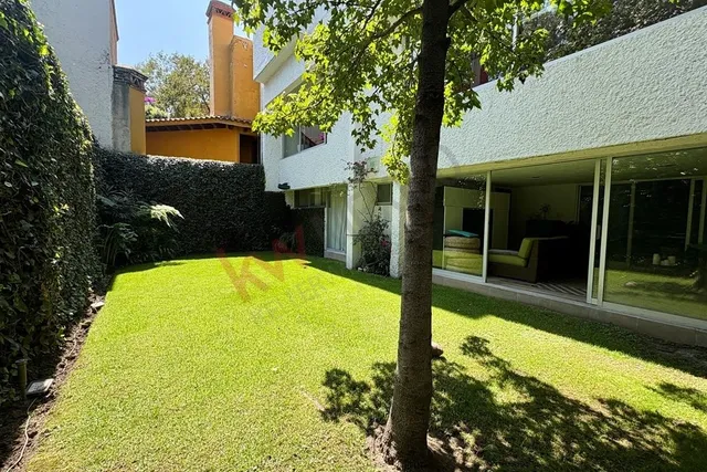 a view of swimming pool with a garden