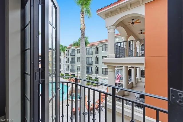a view of buildings from a balcony