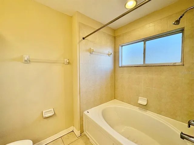 a bathroom with a bathtub