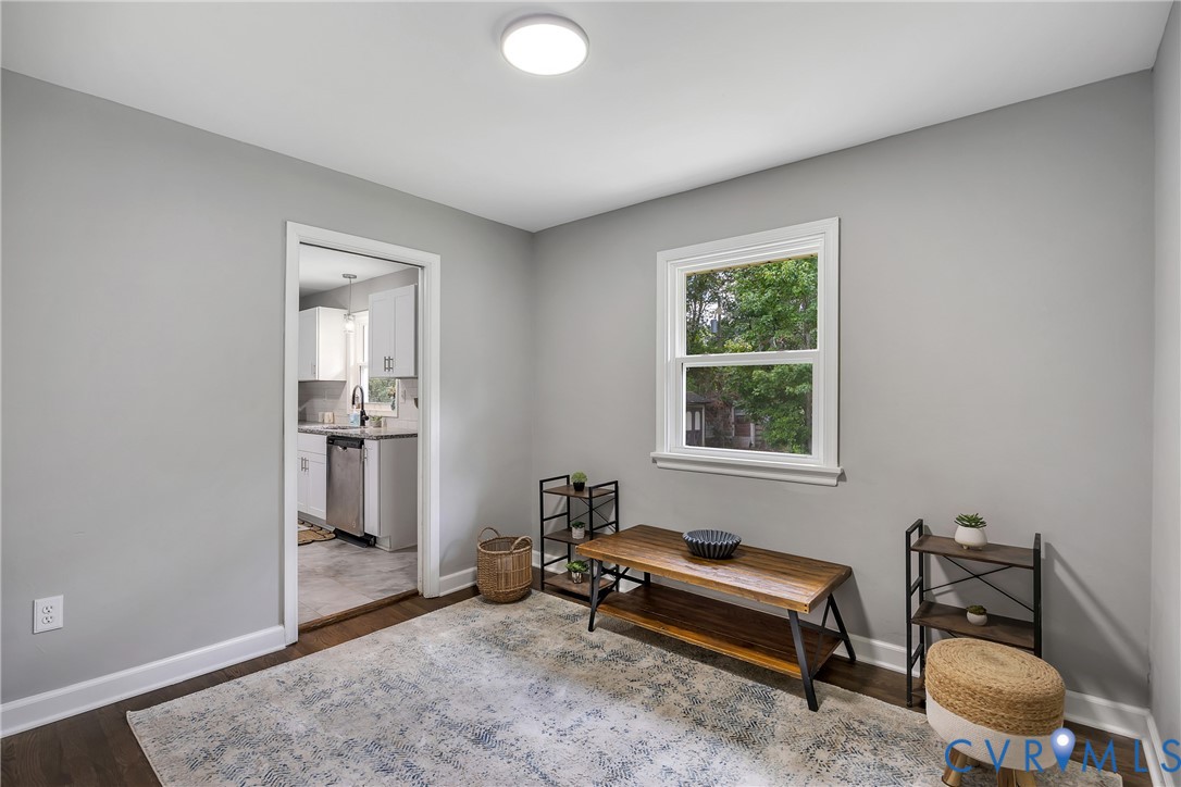 5702 West Rois Road Richmond, VA 23227 - Photo 11 of 22 a living room with furniture and a window
