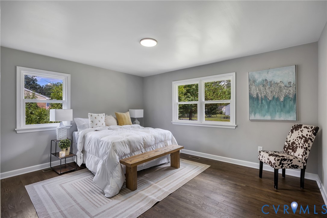 5702 West Rois Road Richmond, VA 23227 - Photo 12 of 22 a bedroom with a bed and a window