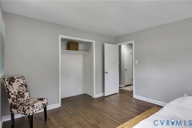 a view of livingroom with hardwood floor and hallway