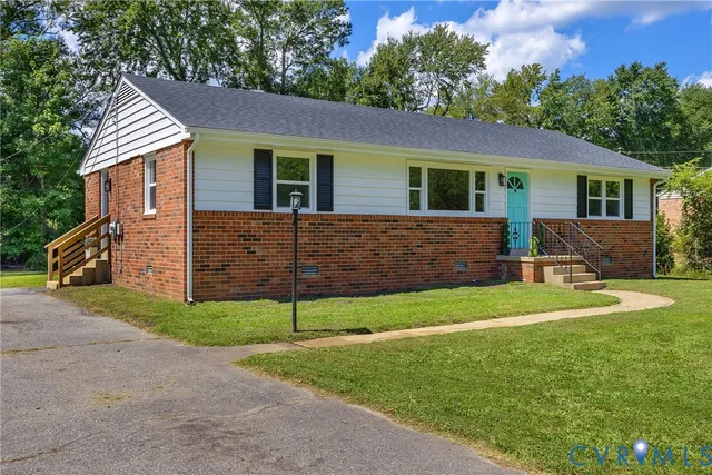 front view of a house with a yard
