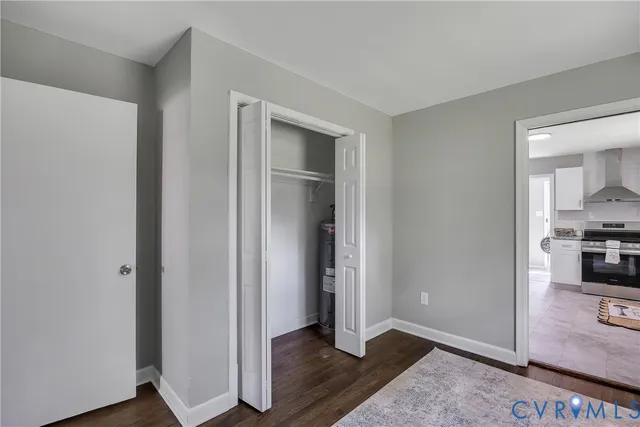 a view of livingroom with hardwood floor and a sink