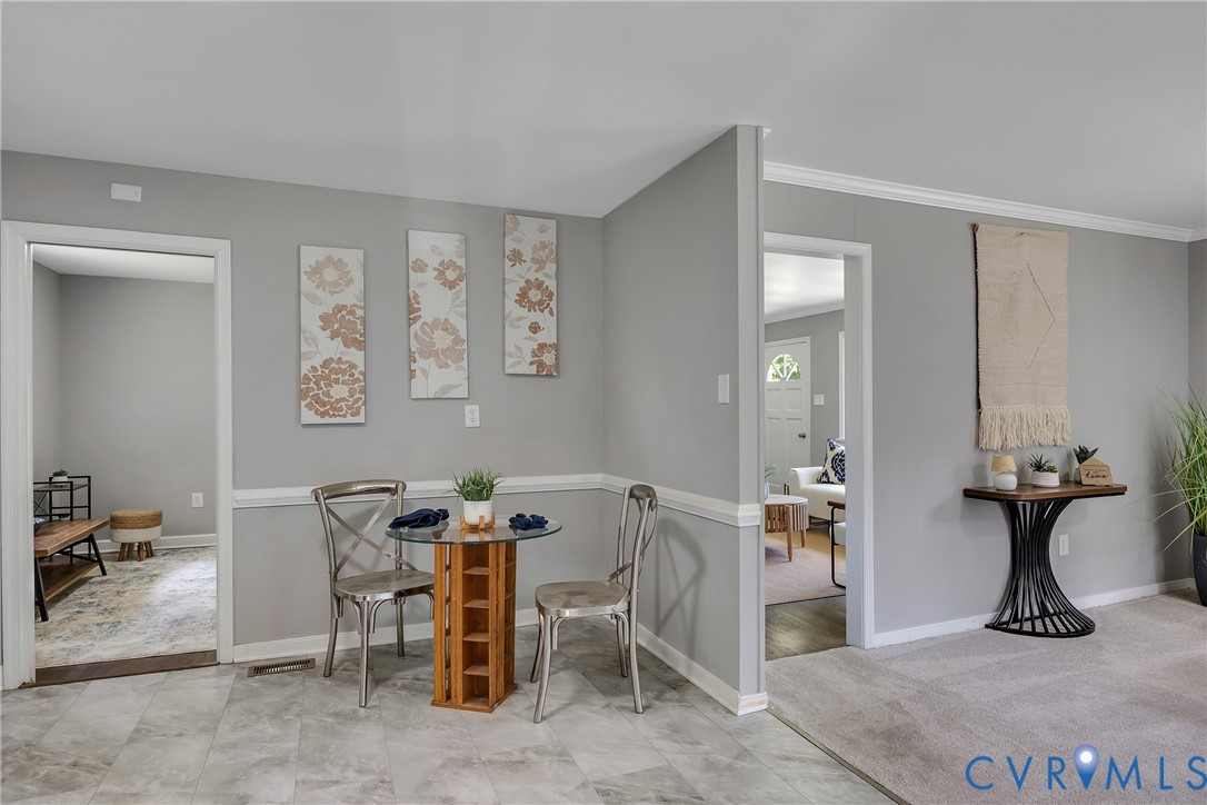 5702 West Rois Road Richmond, VA 23227 - Photo 7 of 22 a view of a workspace with furniture