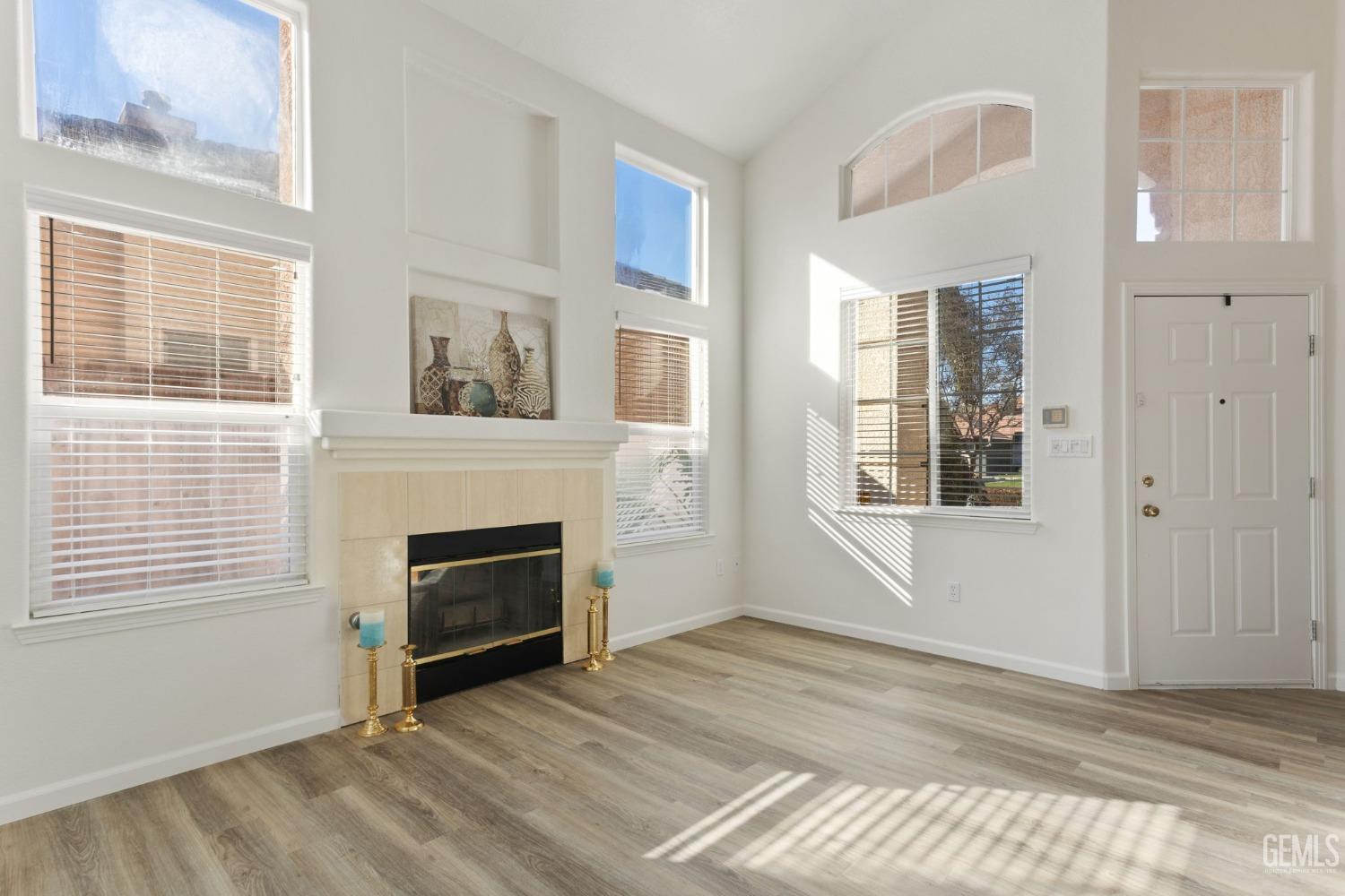 Undisclosed Address Bakersfield, CA 93311 - Photo 13 of 52 a view of a livingroom with a fireplace and window