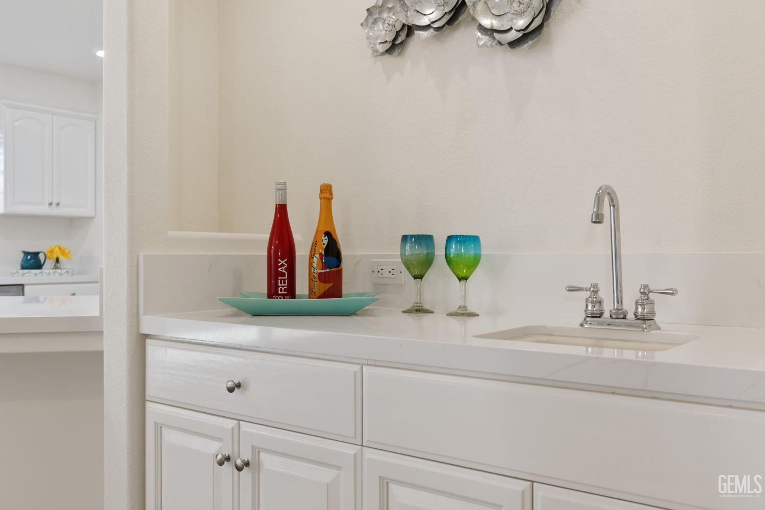 Undisclosed Address Bakersfield, CA 93311 - Photo 24 of 52 a bathroom with a sink and a mirror