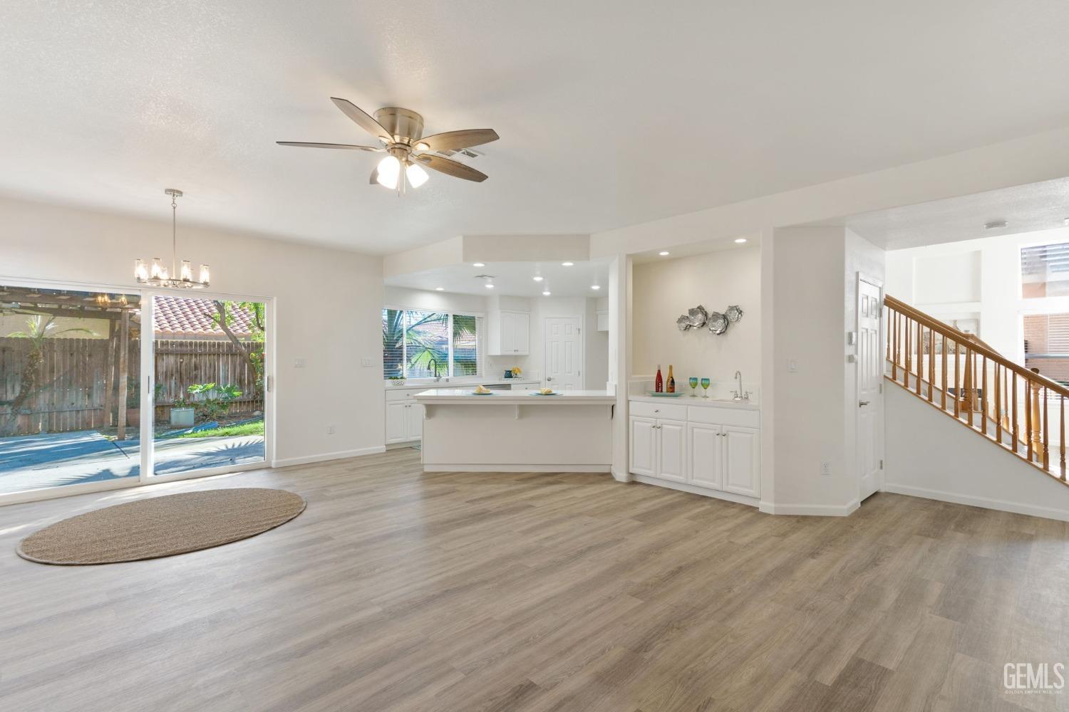 Undisclosed Address Bakersfield, CA 93311 - Photo 27 of 52 a view of an empty room and kitchen view