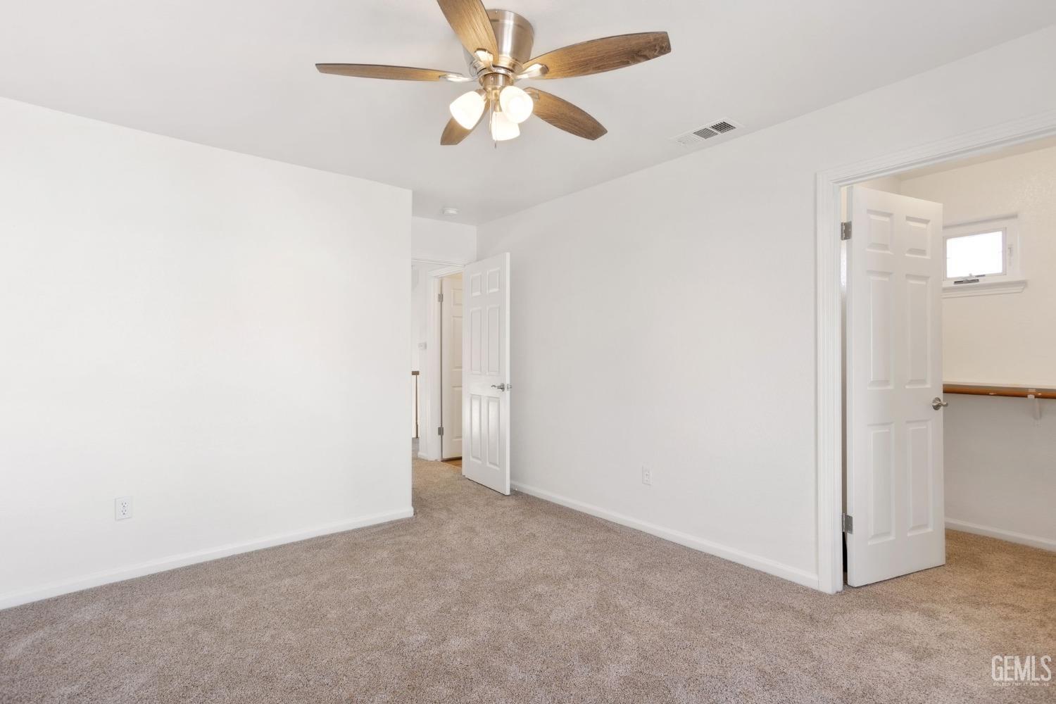Undisclosed Address Bakersfield, CA 93311 - Photo 46 of 52 a view of a big room with carpet