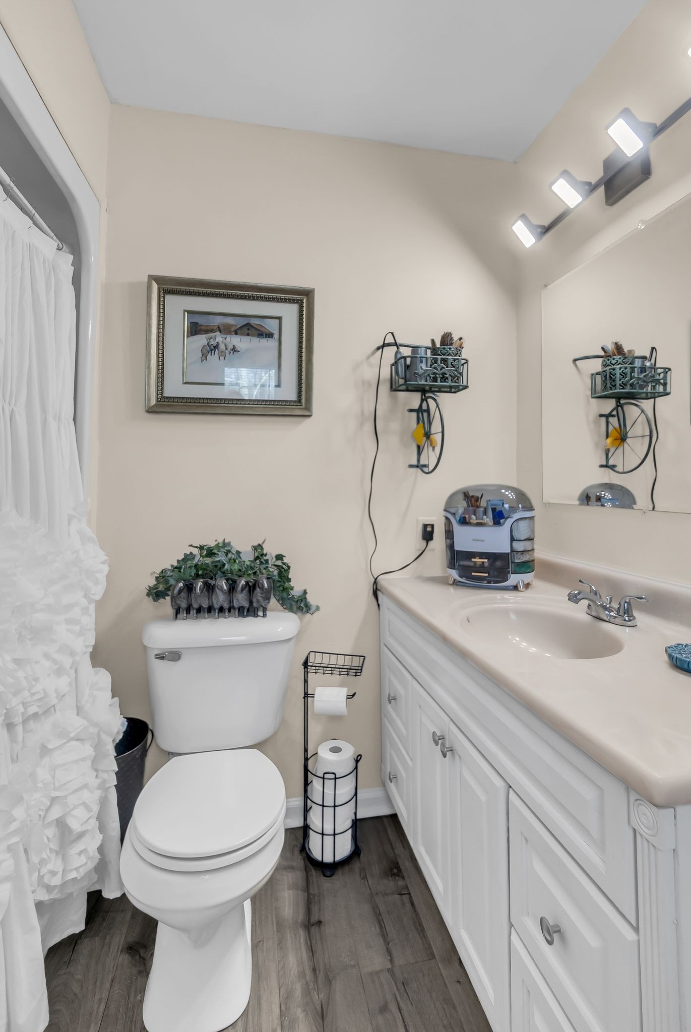 1005 Boyd Street Belfast, TN 37019 - Photo 14 of 24 a bathroom with a toilet sink and mirror