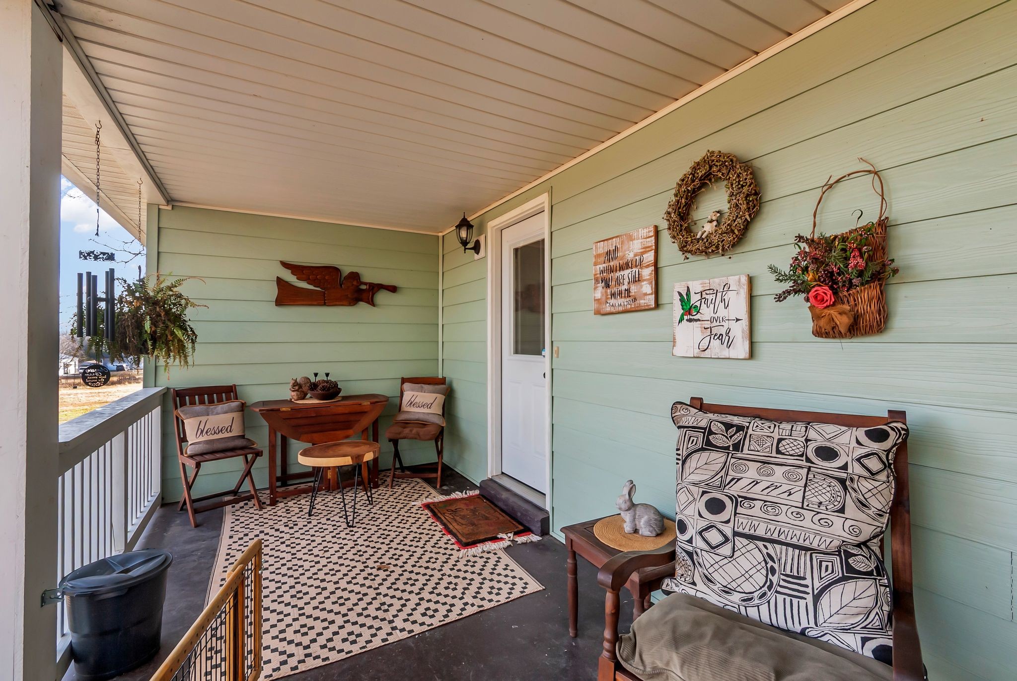 1005 Boyd Street Belfast, TN 37019 - Photo 23 of 24 a outdoor living space with furniture and a black umbrella