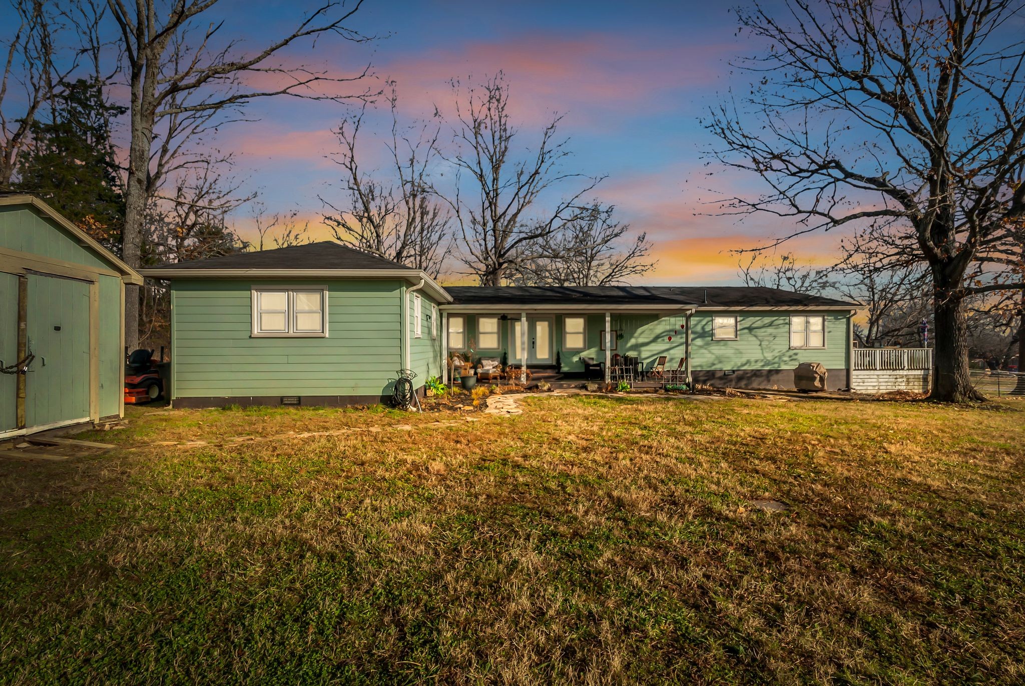 1005 Boyd Street Belfast, TN 37019 - Photo 24 of 24 a front view of a house with a garden and tree