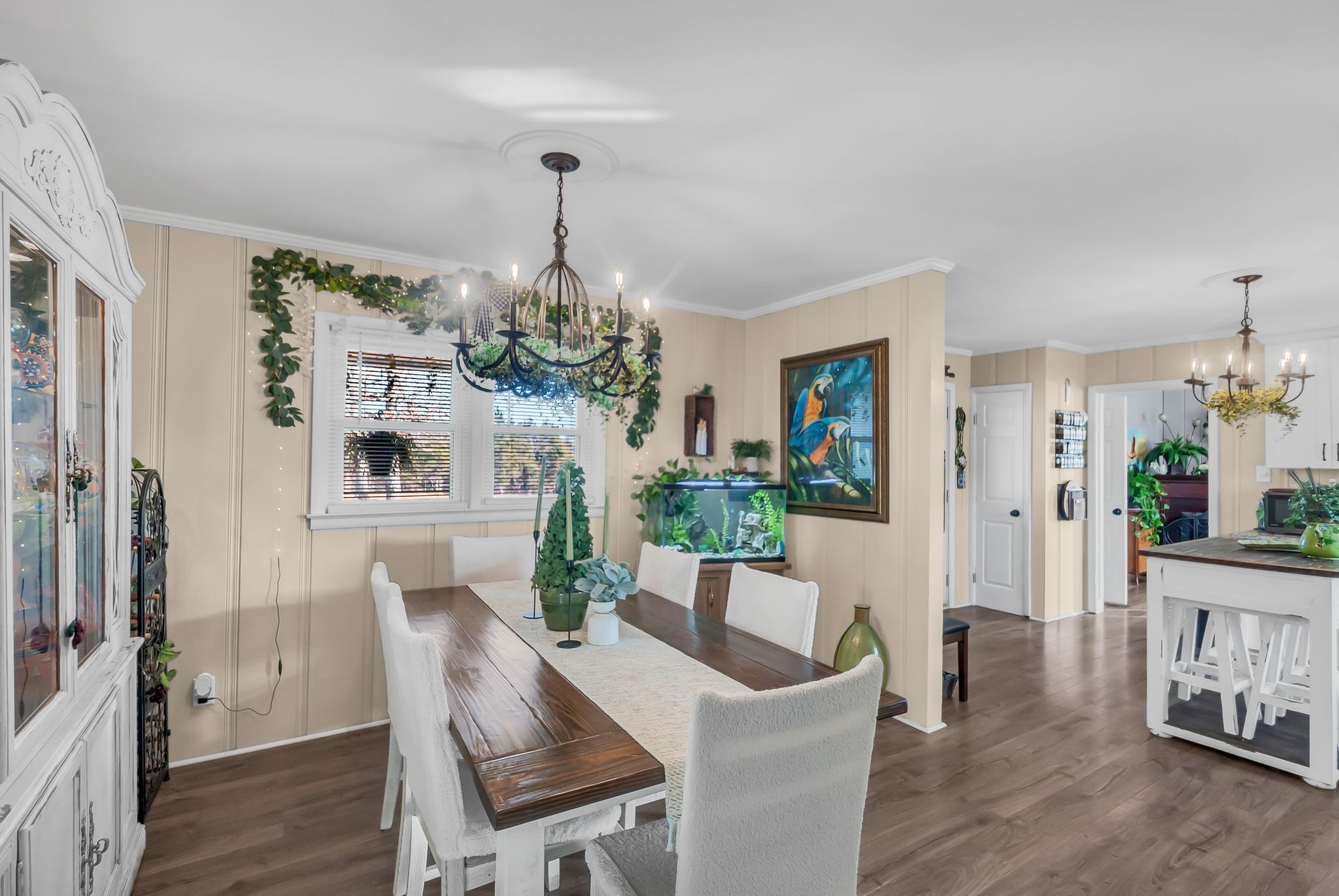 1005 Boyd Street Belfast, TN 37019 - Photo 4 of 24 a dining room with furniture a chandelier and wooden floor
