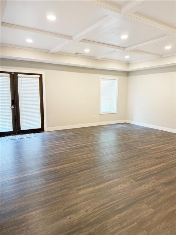 5296 Cheval Rue Court Suwanee, GA 30024 - Photo 43 of 51 a view of an empty room with wooden floor and a window