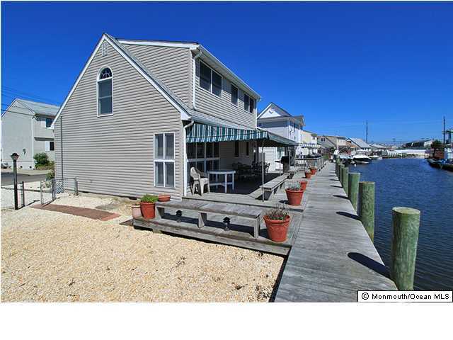 219 Johnson Road Lavallette, NJ 08735 - Photo 1 of 3 a black and white photo of a house