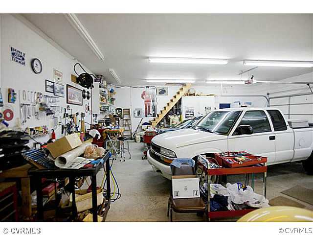 16207 Cox Road Church Road, VA 23833 - Photo 15 of 24 Other - Interior of 3-car garage - note stairs to
