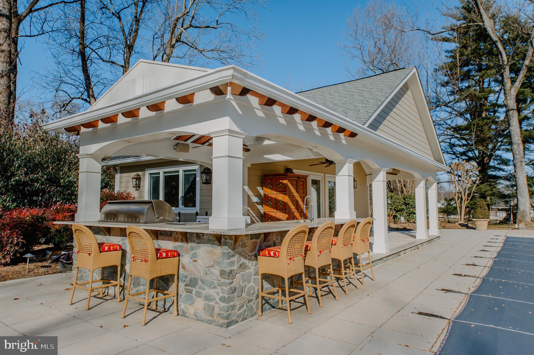 9606 Falls Road Potomac, MD 20854 - Photo 28 of 38 Outdoor kitchen with seating