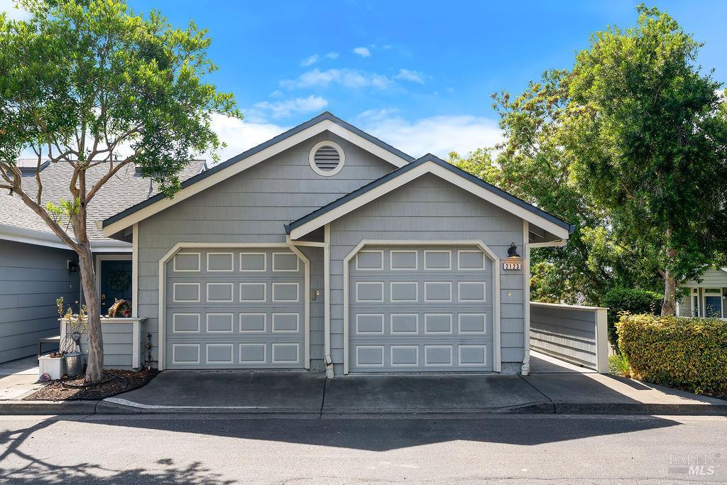 2123 Stonefield Lane Santa Rosa, CA 95403 - Photo 3 of 74 Two separate doors allow one garage bay to be extra deep. Garage floors are epoxy coated as well.