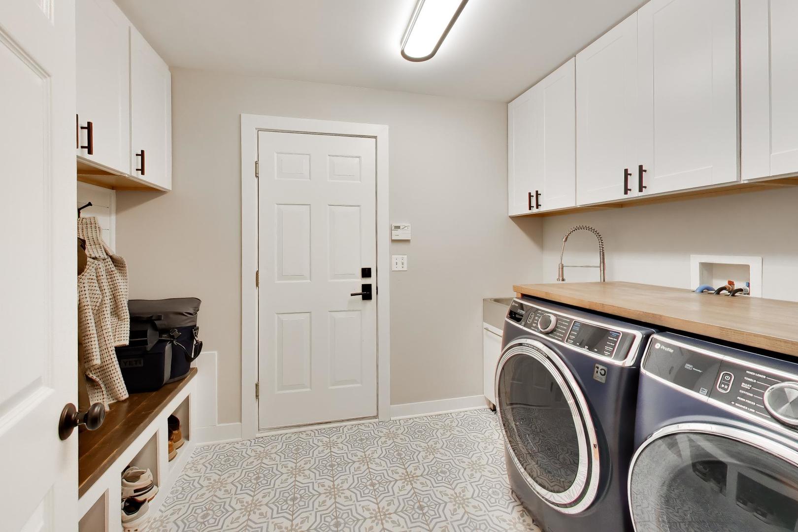 741 Juniper Lane Lake In The Hills, IL 60156 - Photo 17 of 43 a utility room with sink dryer and washer