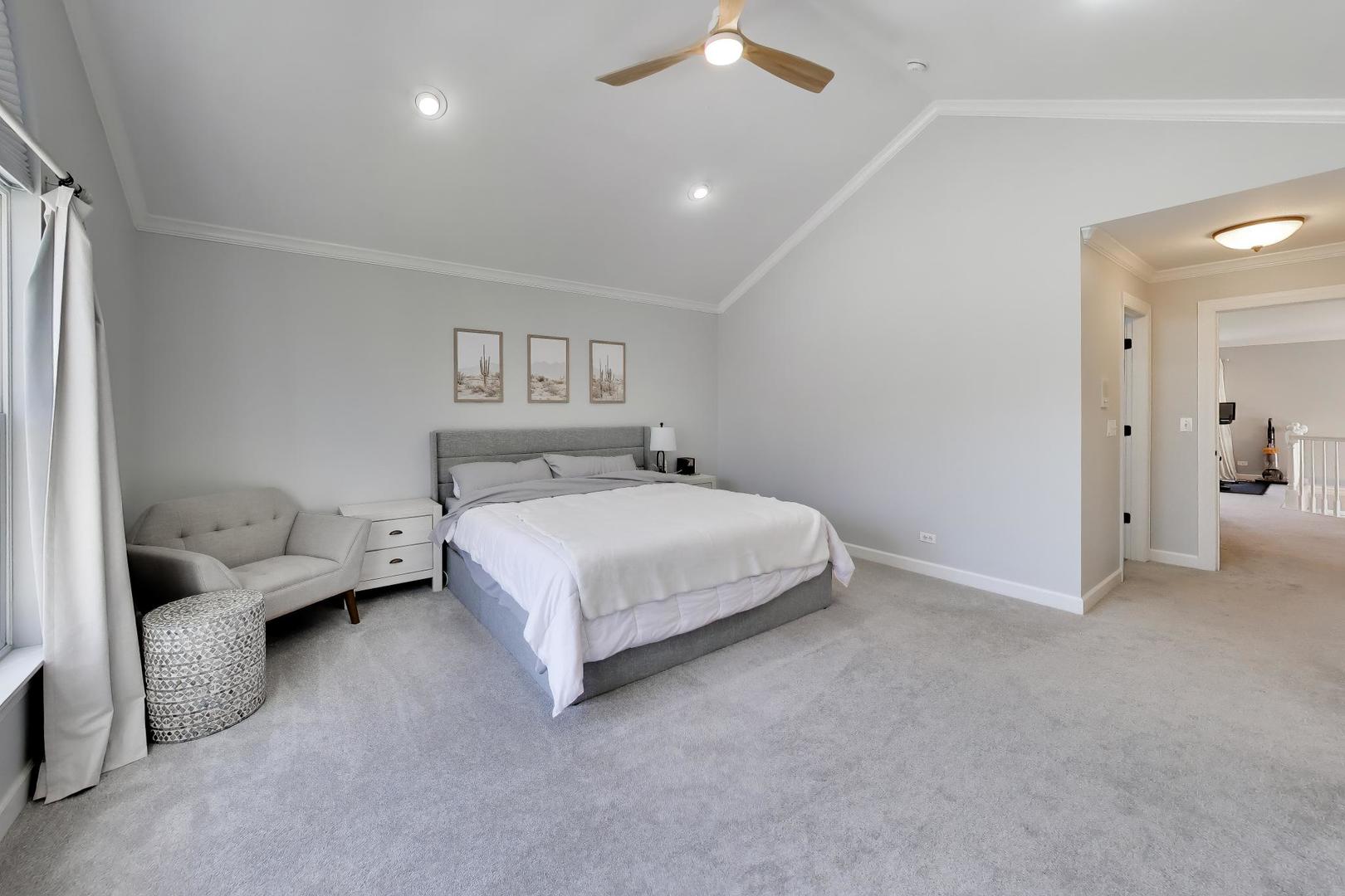 741 Juniper Lane Lake In The Hills, IL 60156 - Photo 22 of 43 a bedroom with a bed and a couch