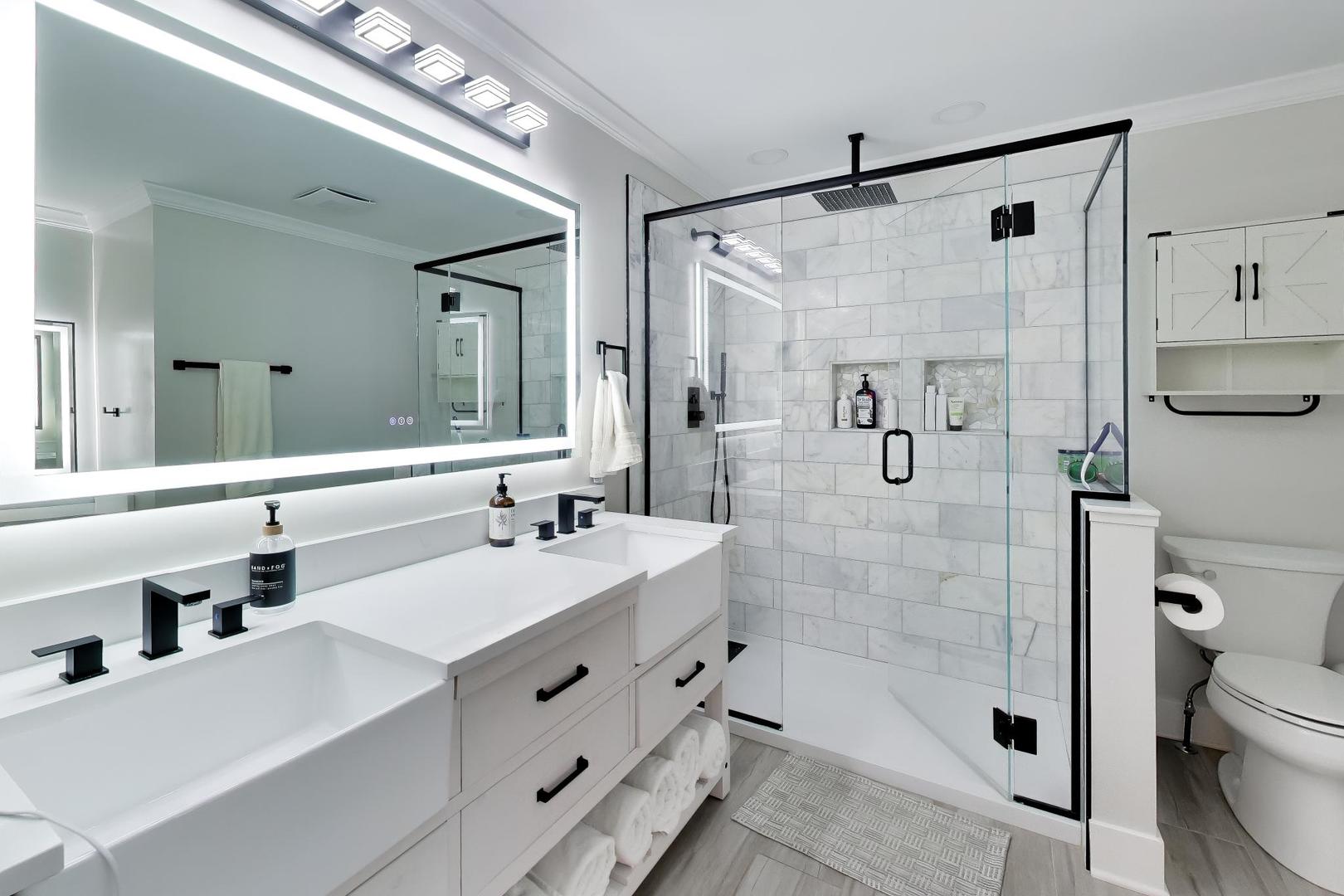 741 Juniper Lane Lake In The Hills, IL 60156 - Photo 24 of 43 a bathroom with a double vanity sink toilet mirror and shower