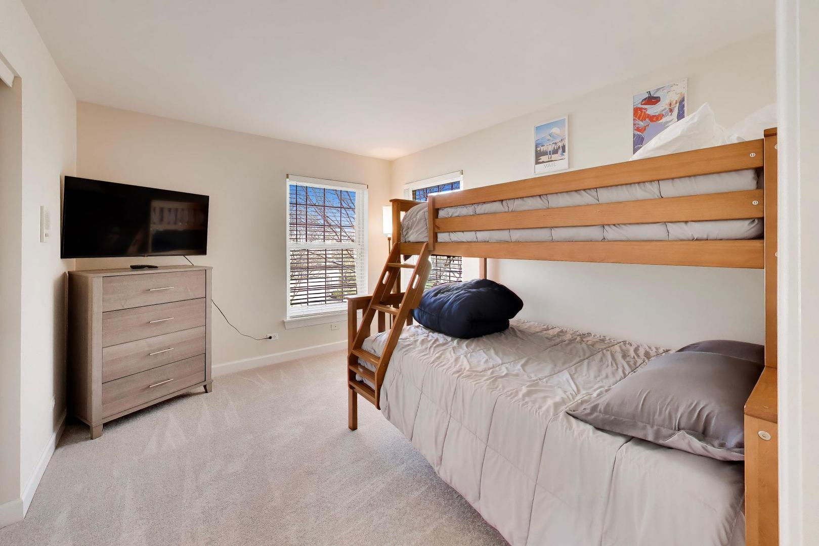 741 Juniper Lane Lake In The Hills, IL 60156 - Photo 25 of 43 a bedroom with a bed and flat screen tv