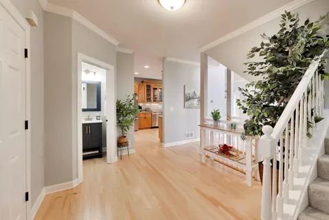a view of livingroom with furniture and refrigerator